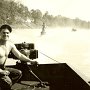 Chigaros in boat, Mitchell on board.